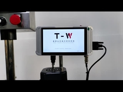 étiquetage des bouteilles de mahcine avec imprimante de date